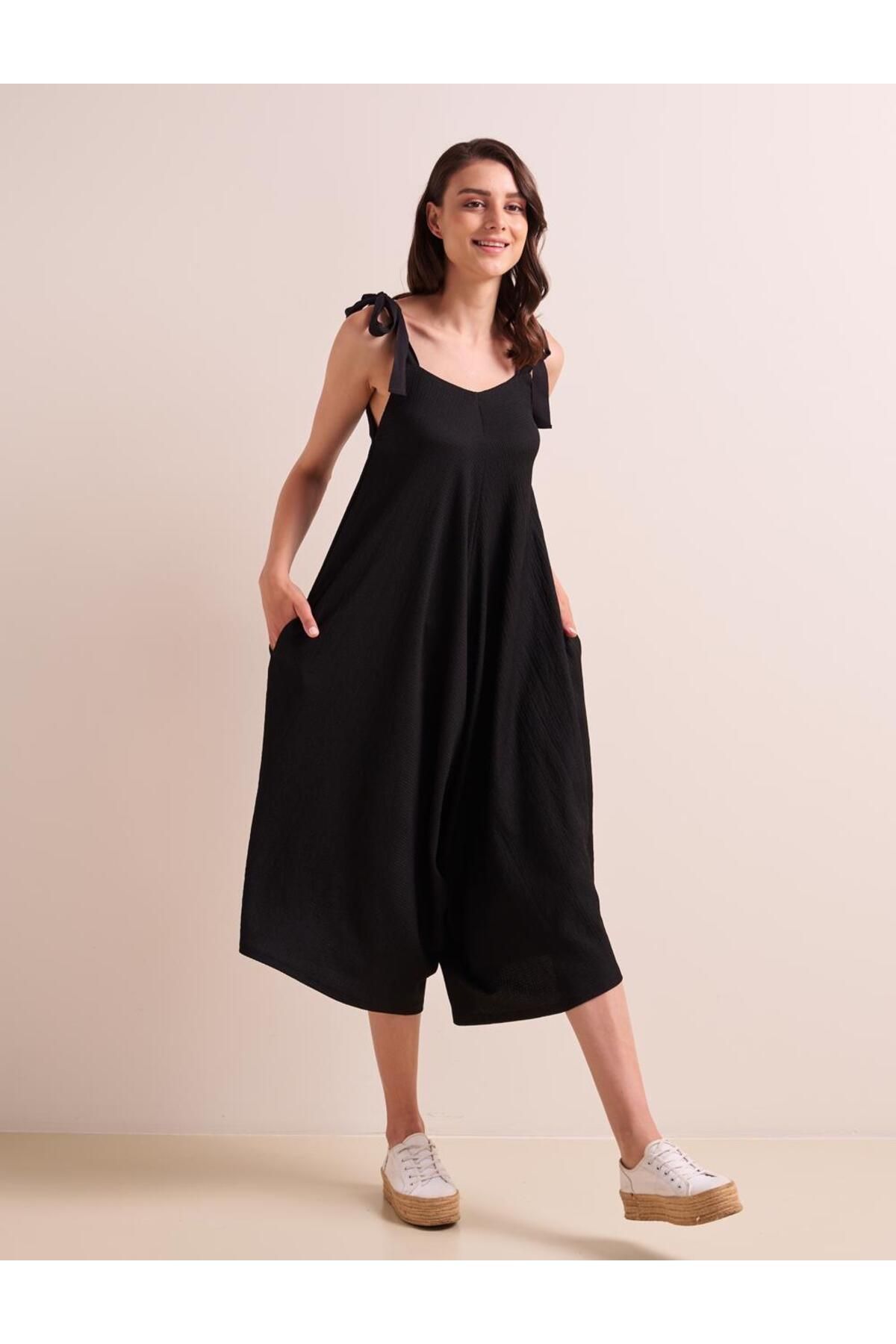 Jimmy Key Black Loose Cut Open Collar Rope Tied Suspender Jumpsuit