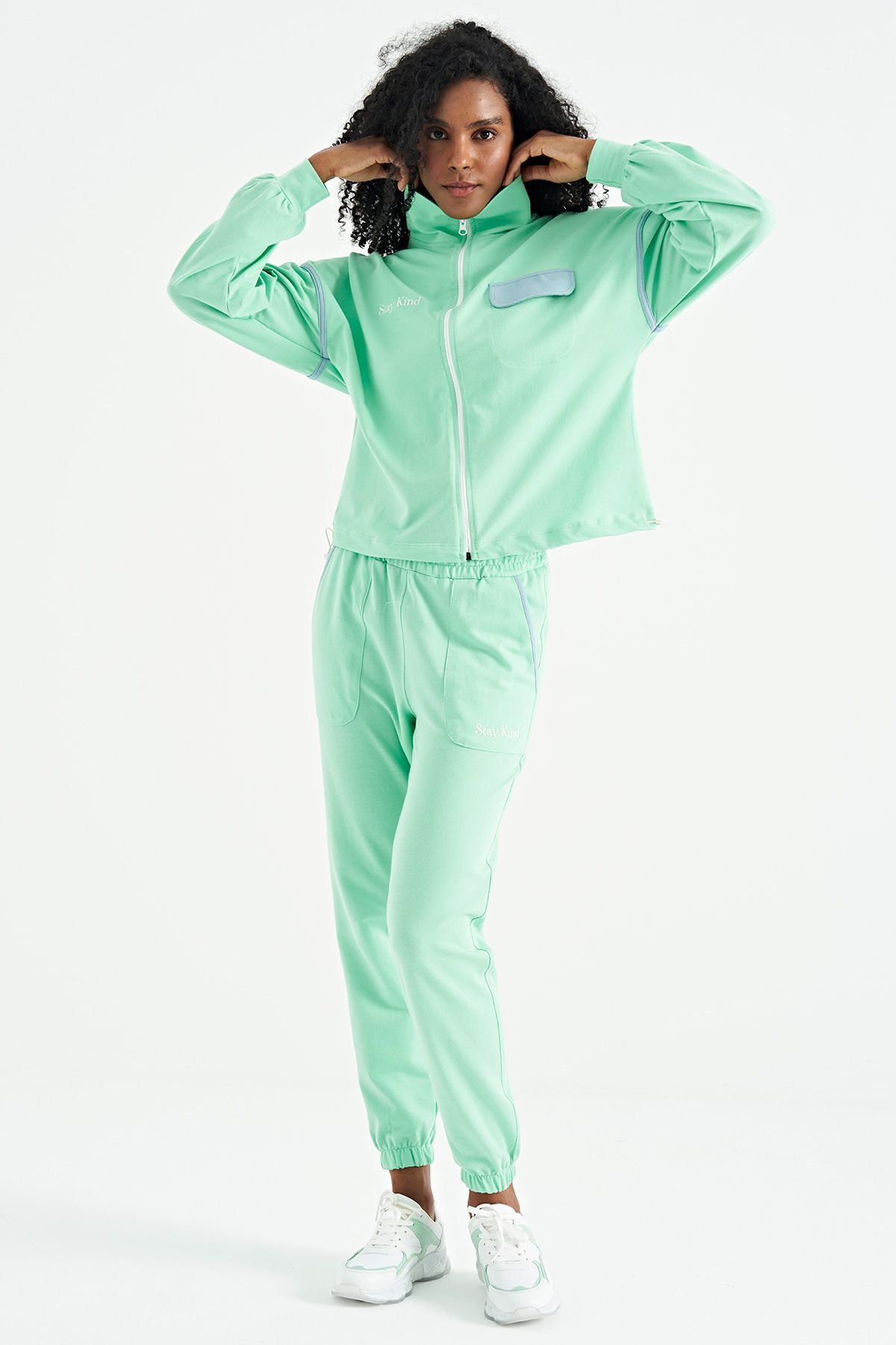 Mint green nike tracksuit hotsell