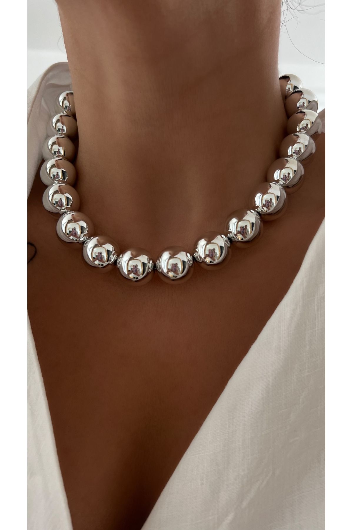 Chunky silver store ball necklace