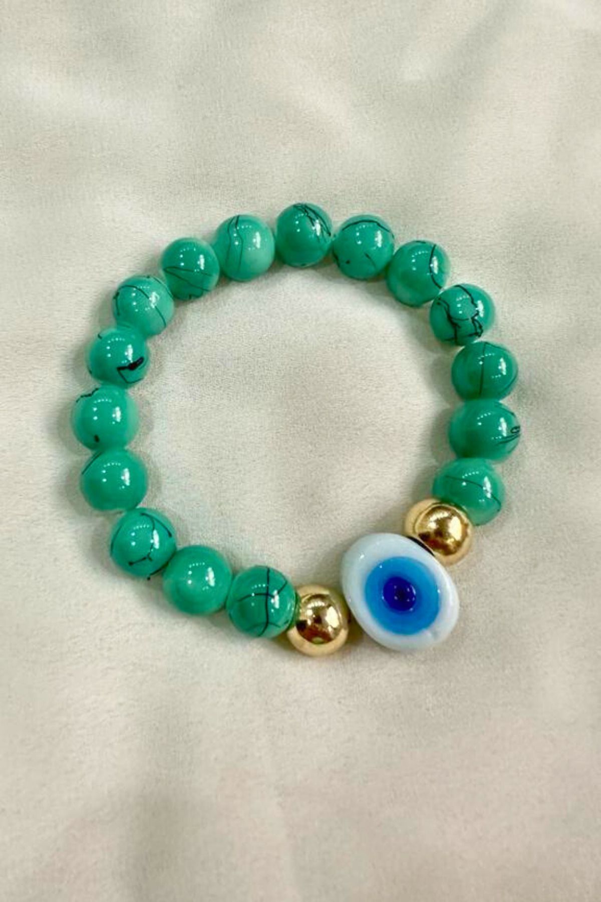 Green evil shop eye bracelet