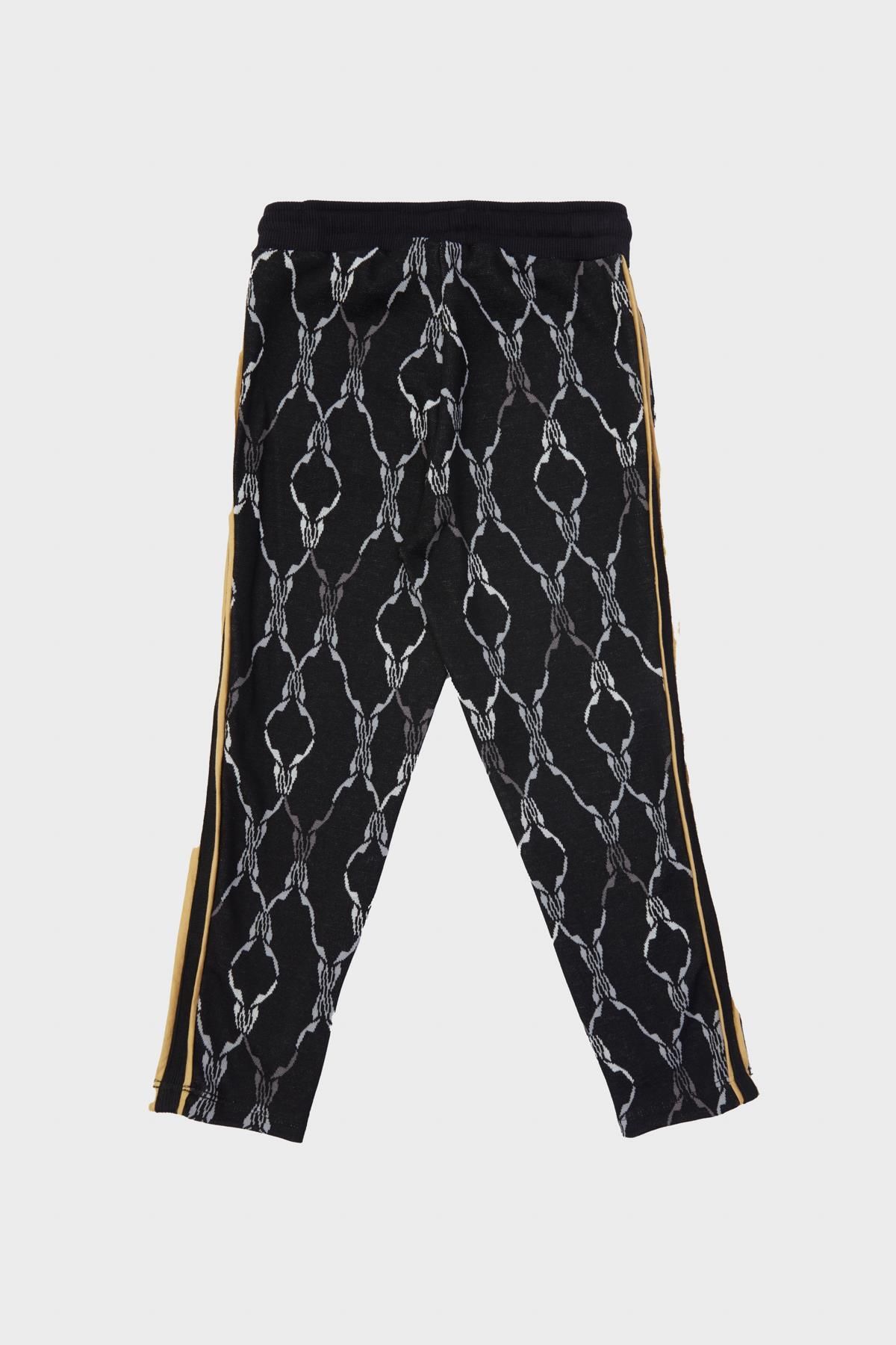 Patterned track pants outlet